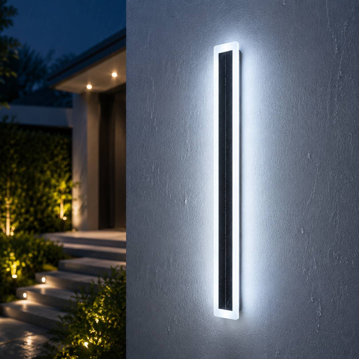 Cool white modern solar LED wall light mounted beside garden steps